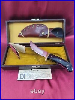 Buck 401 Kalinga knife with original leather sheath papers and display case