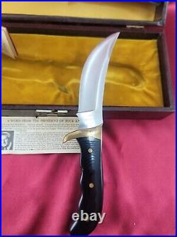 Buck 401 Kalinga knife with original leather sheath papers and display case