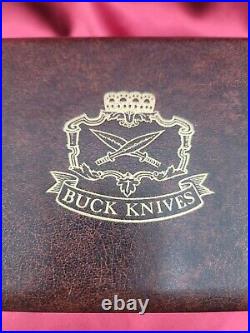 Buck 401 Kalinga knife with original leather sheath papers and display case