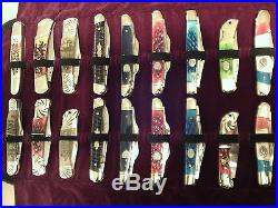 LOT OF 36 NEW ASSORTED FOLDING POCKET KNIVES IN NEW PADDED ROLL UP STORAGE CASE