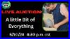 Live-Auction-Selling-Storage-Unit-Finds-A-Little-Of-Everything-Auction-Style-Bin-01-ycij