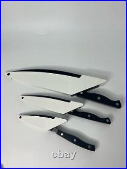Lot of 3 The Pampered Chef 8, 5, & 3 Knives with Self Sharpening Storage Cases